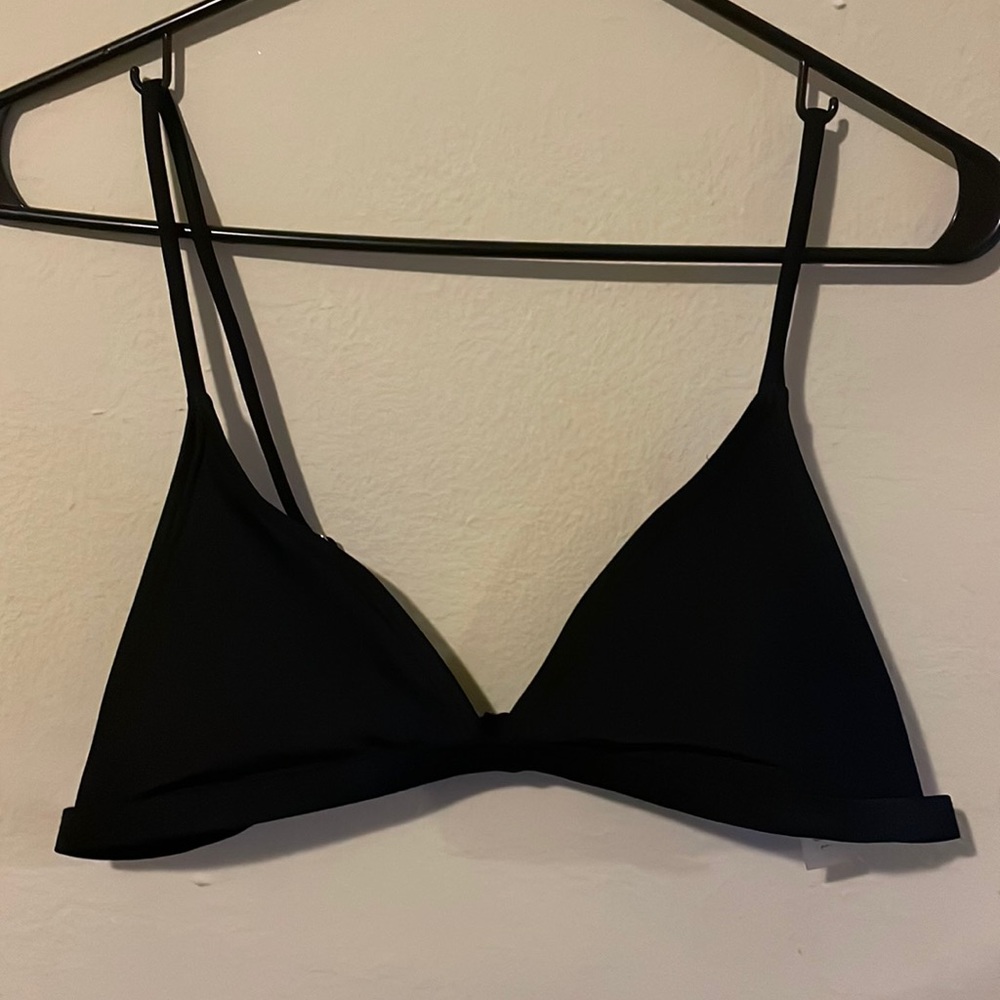 The top is a large but it fits like a small.